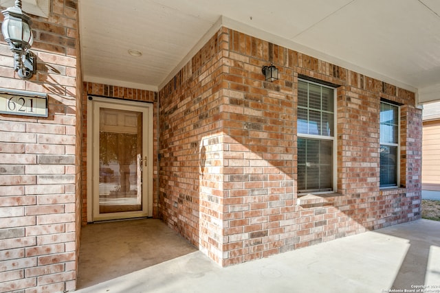 entrance to property with a porch