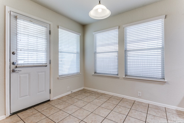 interior space featuring light tile patterned floors