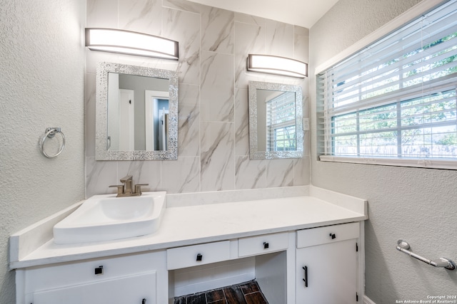 bathroom with hardwood / wood-style floors and vanity