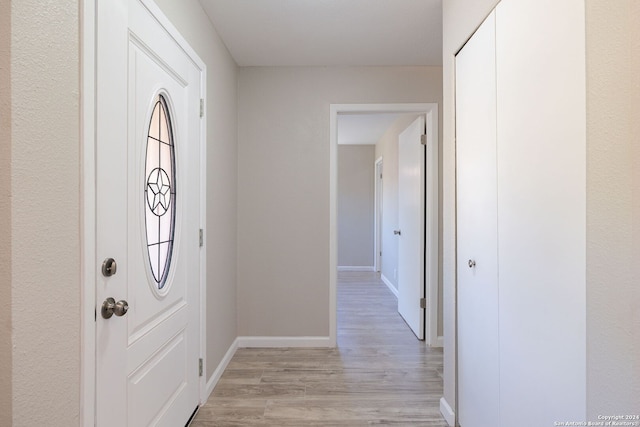 foyer with light hardwood / wood-style floors