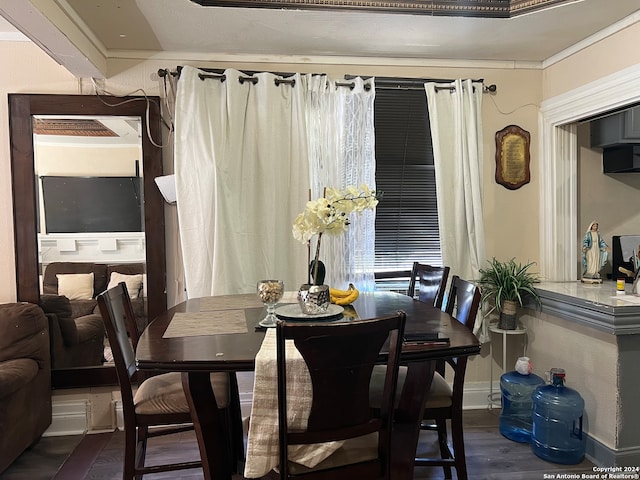 dining area with dark wood-type flooring