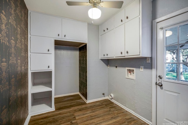 laundry area with cabinets, hookup for a washing machine, gas dryer hookup, electric dryer hookup, and dark wood-type flooring