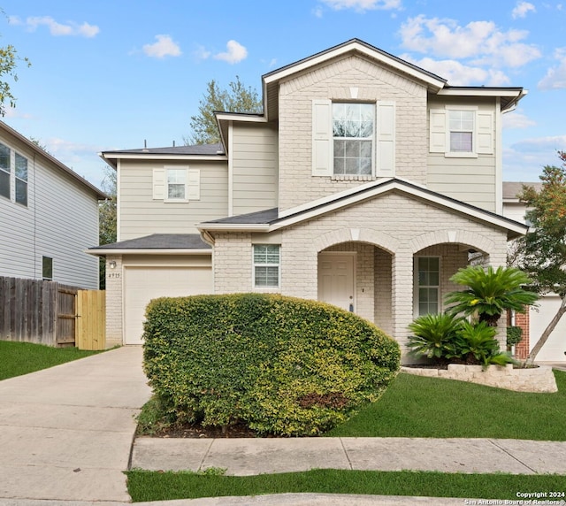 view of front of property with a garage