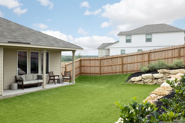 view of yard featuring a patio area and an outdoor hangout area