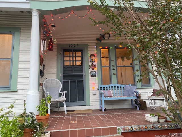 doorway to property featuring a porch