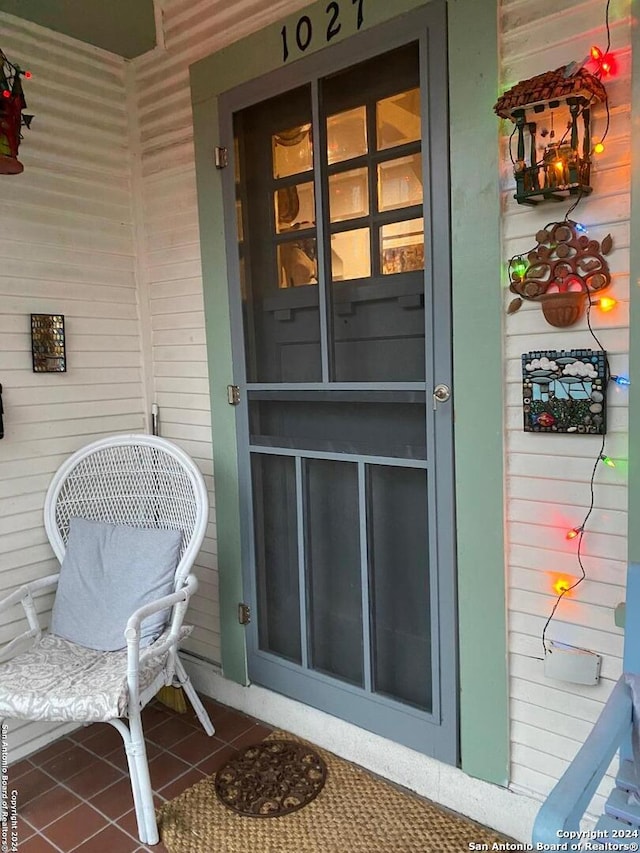 property entrance with a porch