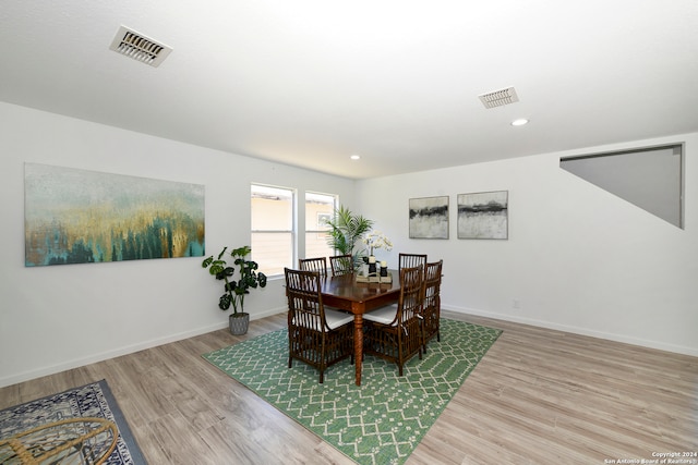 dining area featuring hardwood / wood-style flooring