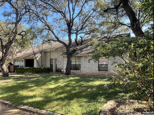 view of home's exterior with a lawn