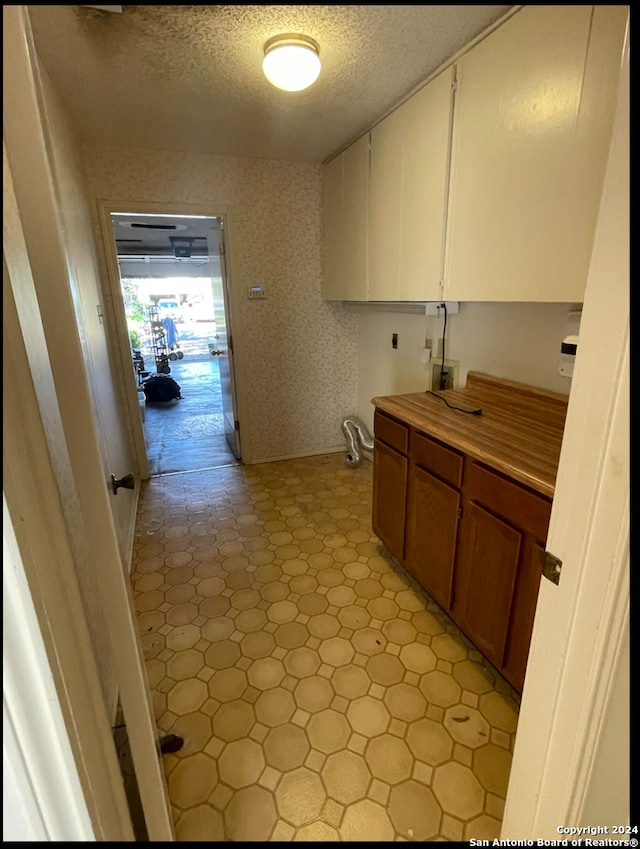 kitchen with a textured ceiling