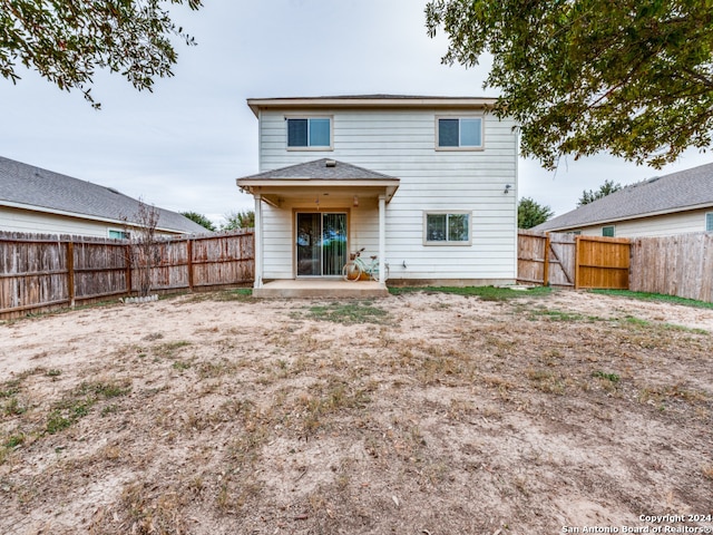 rear view of house featuring a patio area