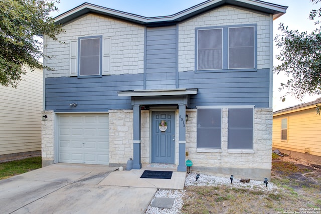 view of front of home featuring a garage