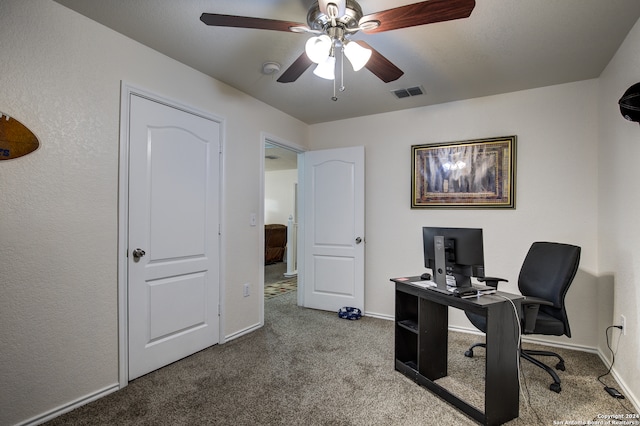 office featuring ceiling fan and carpet