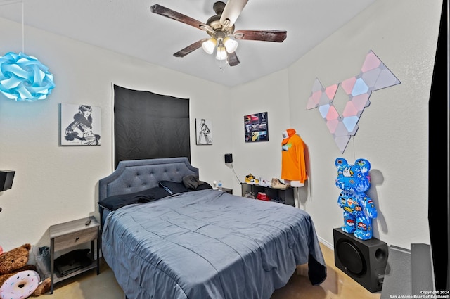 bedroom featuring ceiling fan and light colored carpet