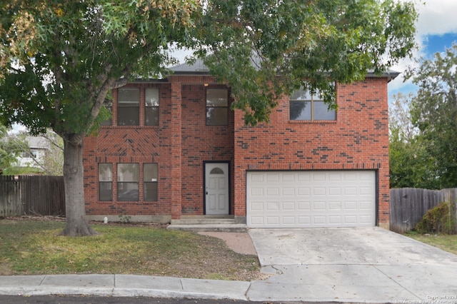 view of front of property with a garage