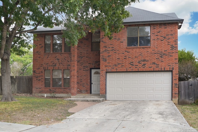 view of front of property featuring a garage