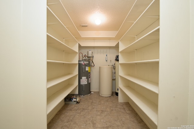 pantry featuring electric water heater