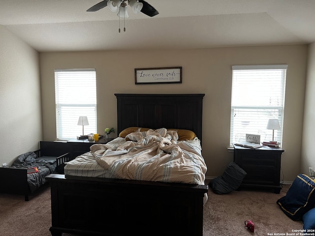 carpeted bedroom featuring ceiling fan