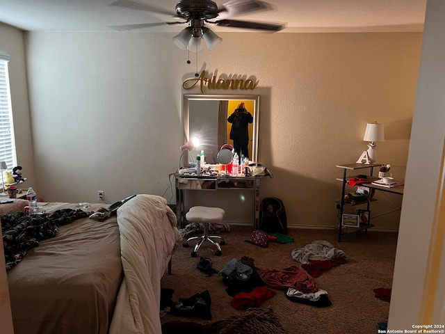 bedroom featuring ceiling fan and carpet floors