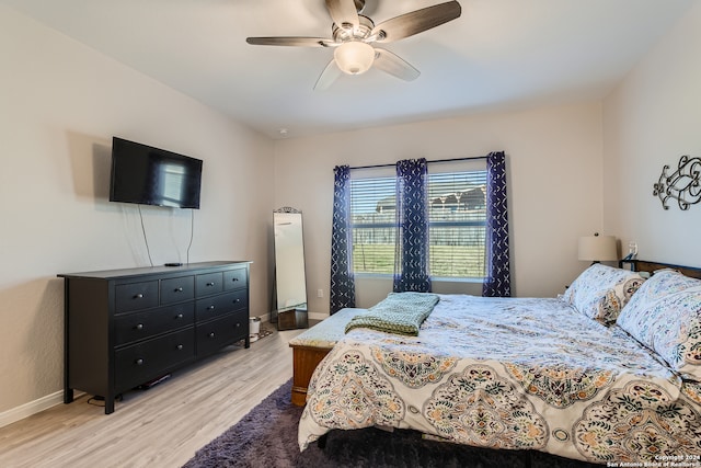 bedroom featuring ceiling fan and light wood-type flooring