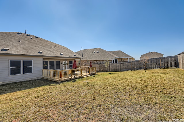 view of yard with a deck