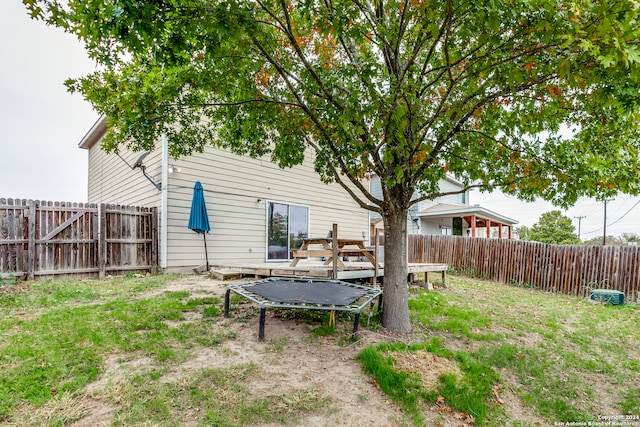 view of yard featuring a trampoline