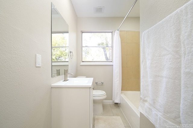 full bathroom with vanity, toilet, and shower / tub combo with curtain