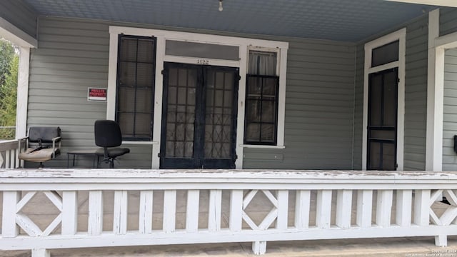 entrance to property with a porch