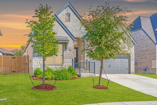 2116 Calate Rdg, San Antonio, TX 78253 - french country home with stone siding, concrete driveway, and an attached garage