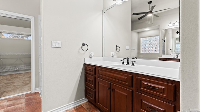 bathroom featuring vanity and ceiling fan