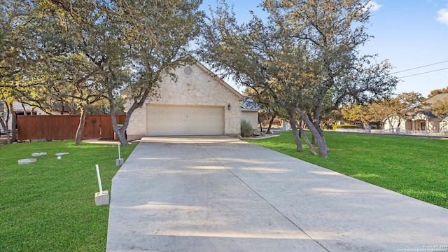 306 Hornpipe Hls, San Antonio, TX 78260 - view of front of home with concrete driveway, an attached garage, and stone siding