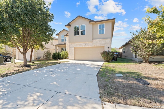 view of front of property featuring a garage