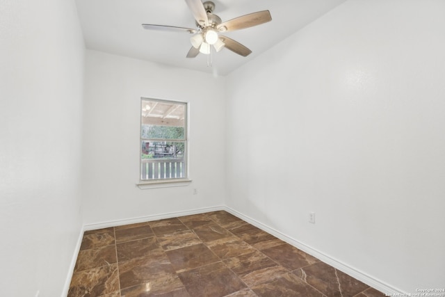 empty room featuring ceiling fan