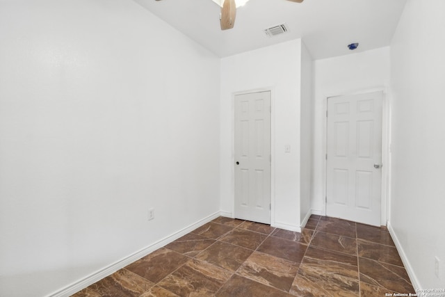 unfurnished bedroom with ceiling fan