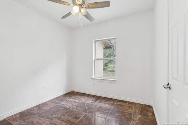 unfurnished room with ceiling fan