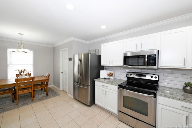 kitchen with decorative backsplash, appliances with stainless steel finishes, crown molding, decorative light fixtures, and white cabinetry