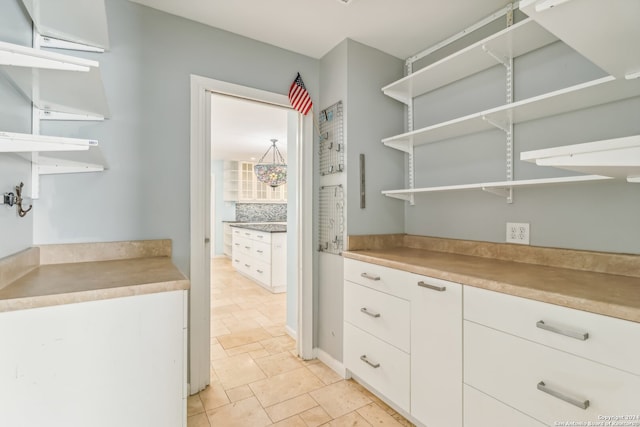 kitchen with white cabinetry