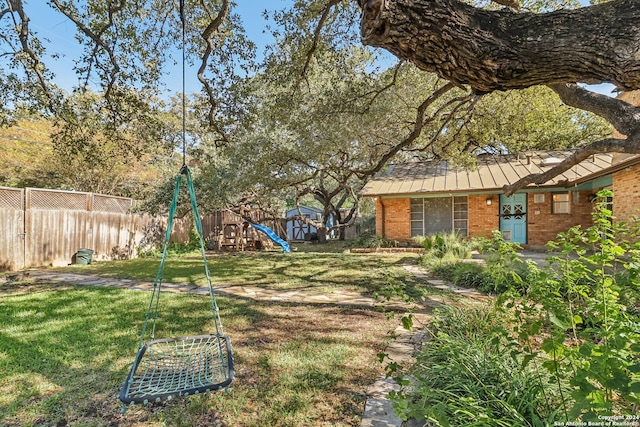 view of yard featuring a playground