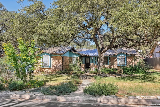 view of front of home with a front yard