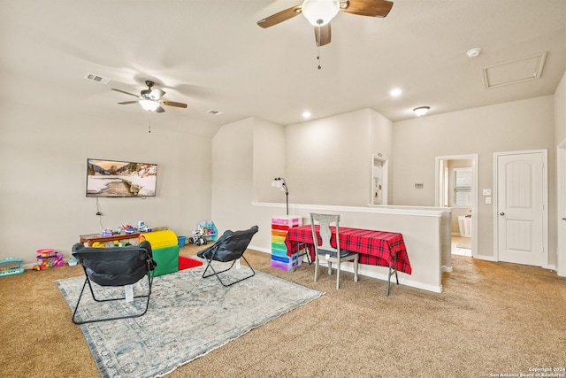 playroom with ceiling fan and carpet floors