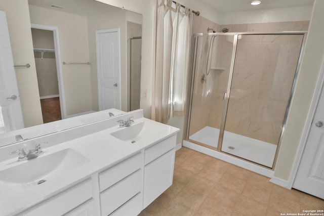 bathroom featuring vanity and walk in shower