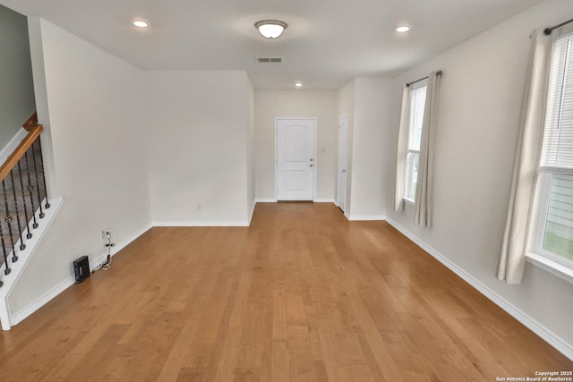 empty room with light wood-type flooring