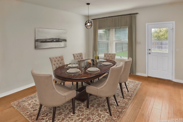 dining area featuring hardwood / wood-style floors