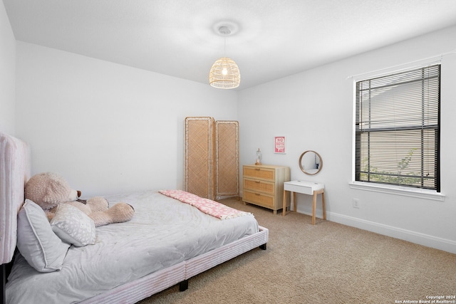 bedroom featuring carpet