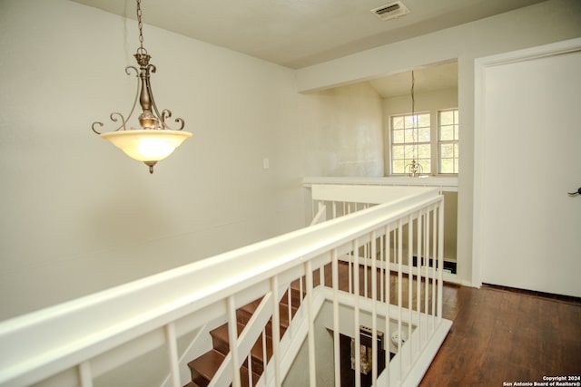 hallway featuring dark wood-type flooring