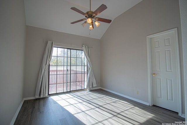 unfurnished room featuring wood-type flooring, vaulted ceiling, and ceiling fan