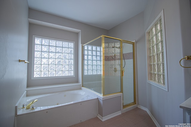 bathroom with plus walk in shower and tile patterned floors