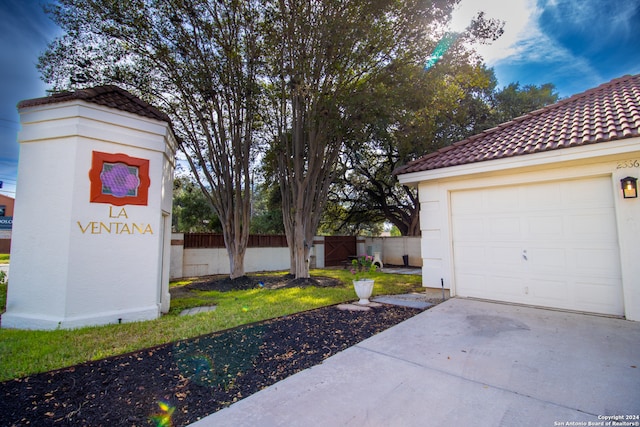 exterior space with a garage