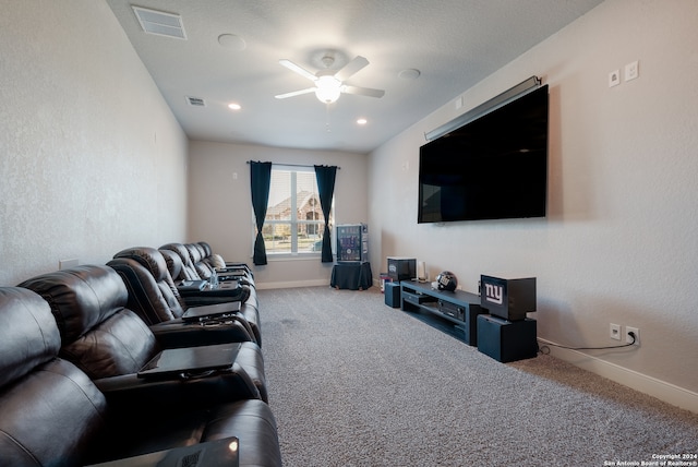 living room featuring carpet floors and ceiling fan