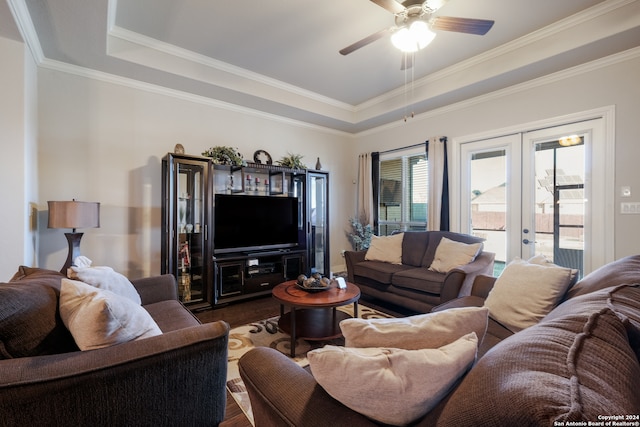 living room featuring crown molding, french doors, ceiling fan, and dark hardwood / wood-style floors