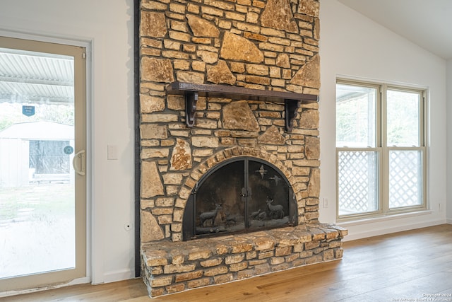 interior details with a fireplace and hardwood / wood-style floors